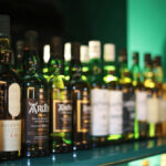 Wine bottles on liquor store shelves