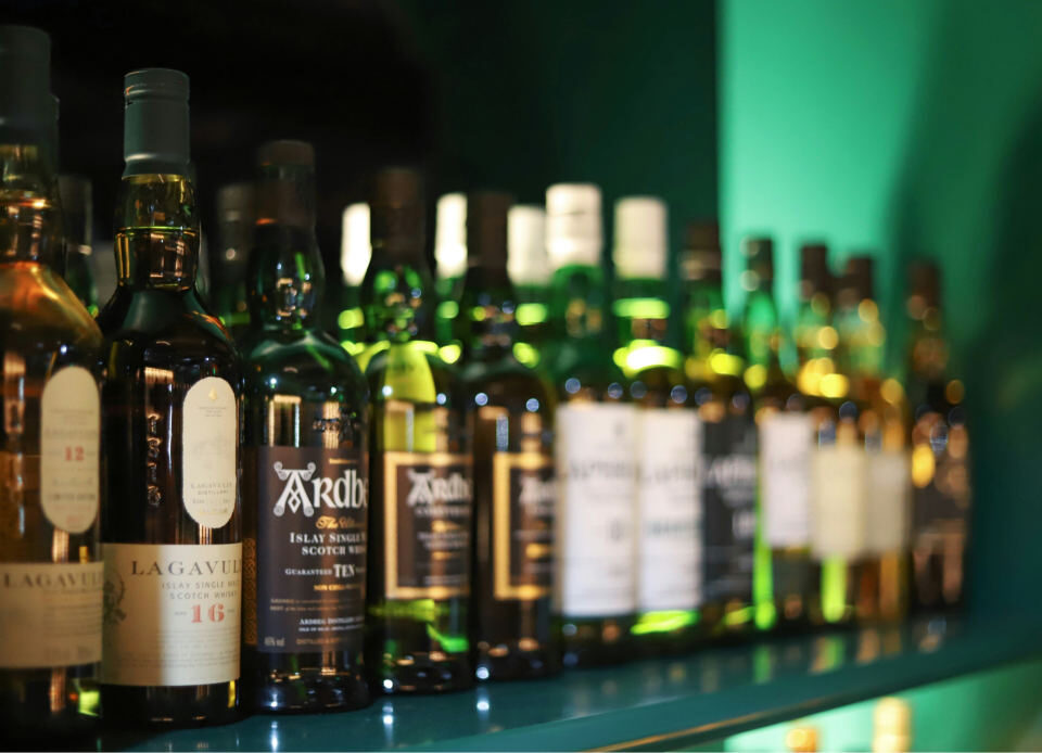 Wine bottles on liquor store shelves